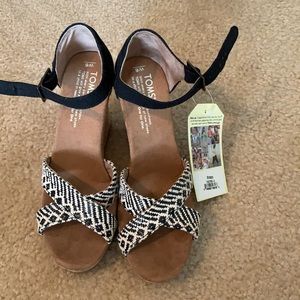 Toms strapped sandals.